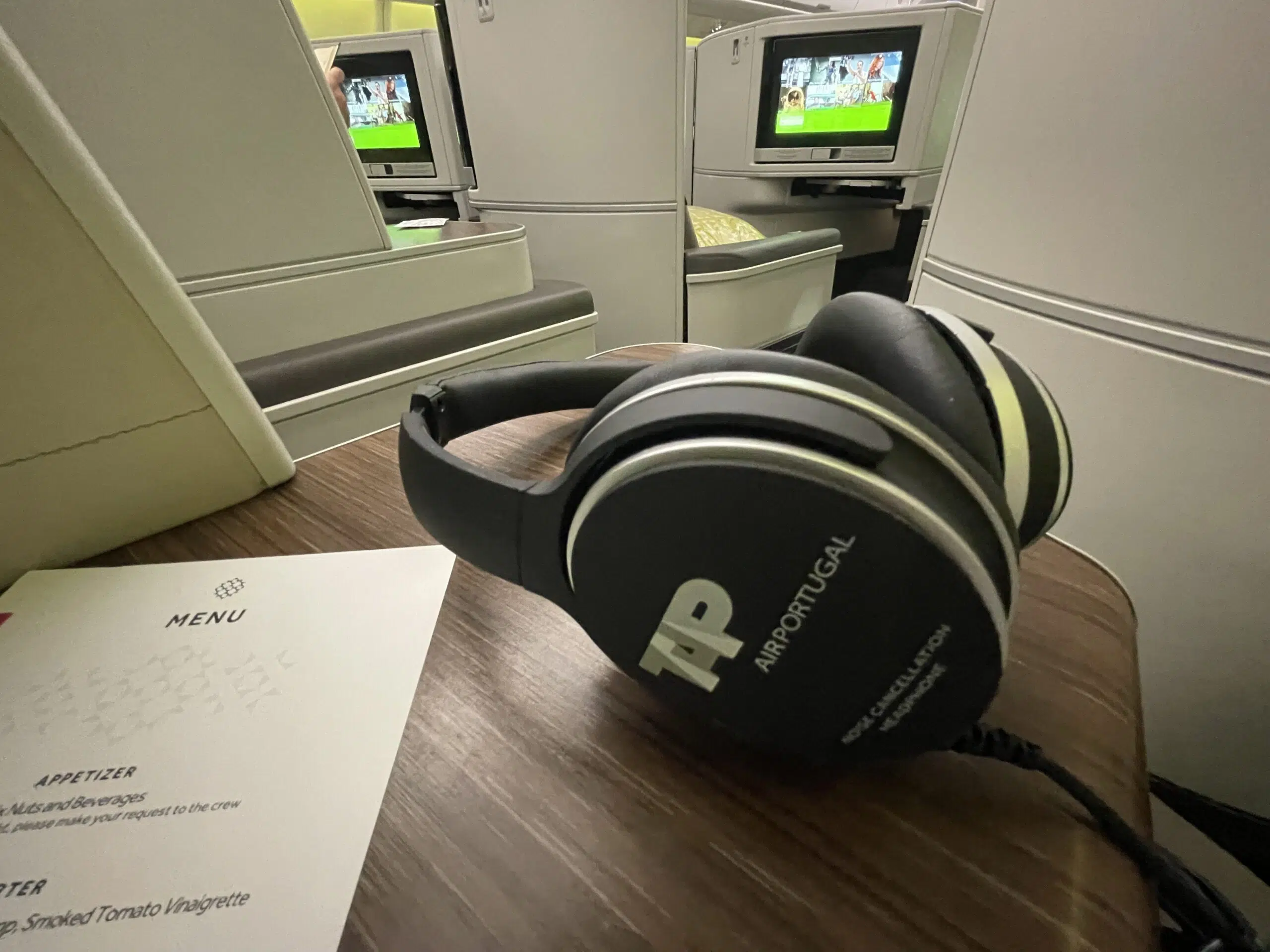 headphones on a business class storage console