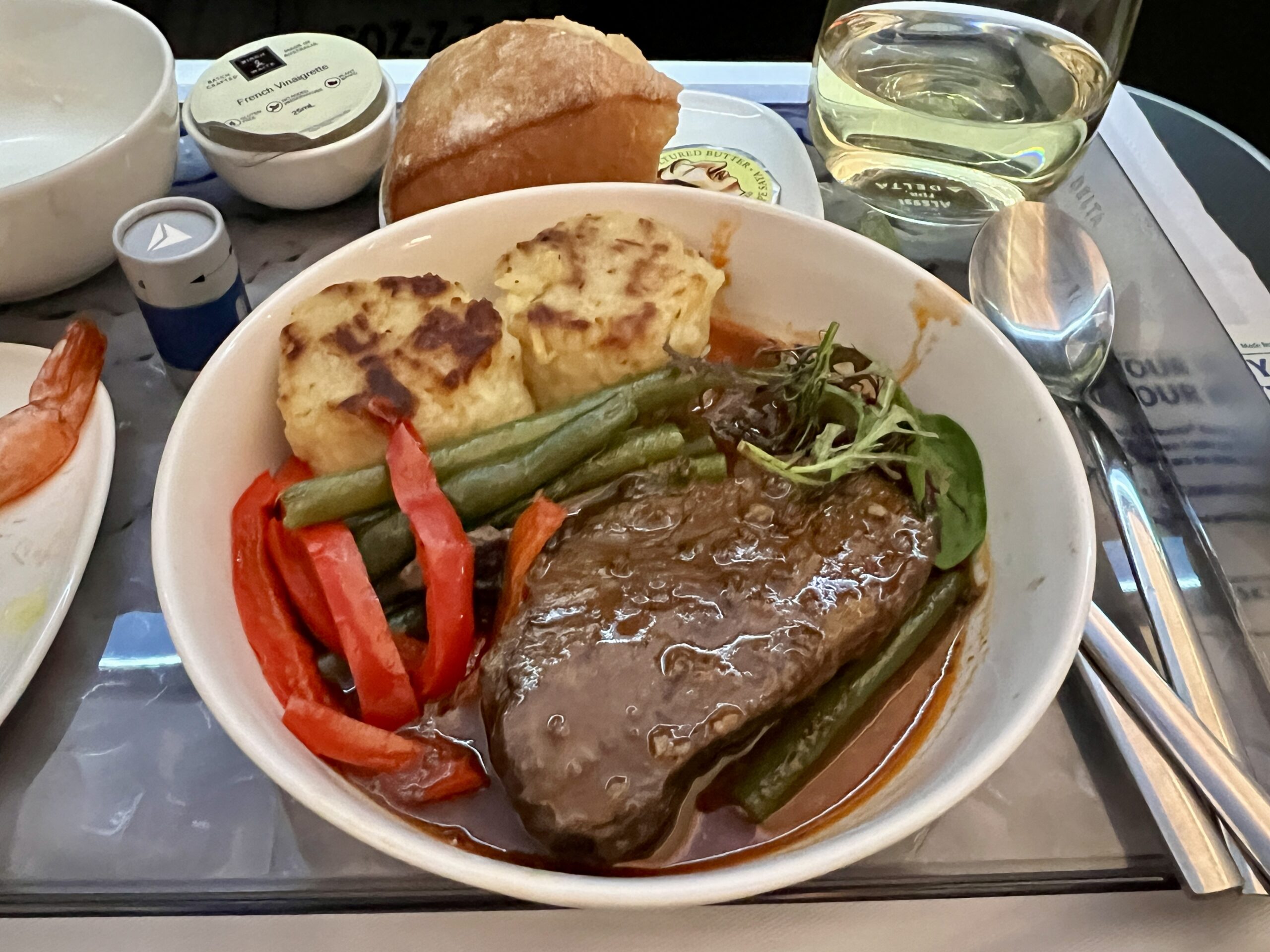 a bowl with beef and vegetables