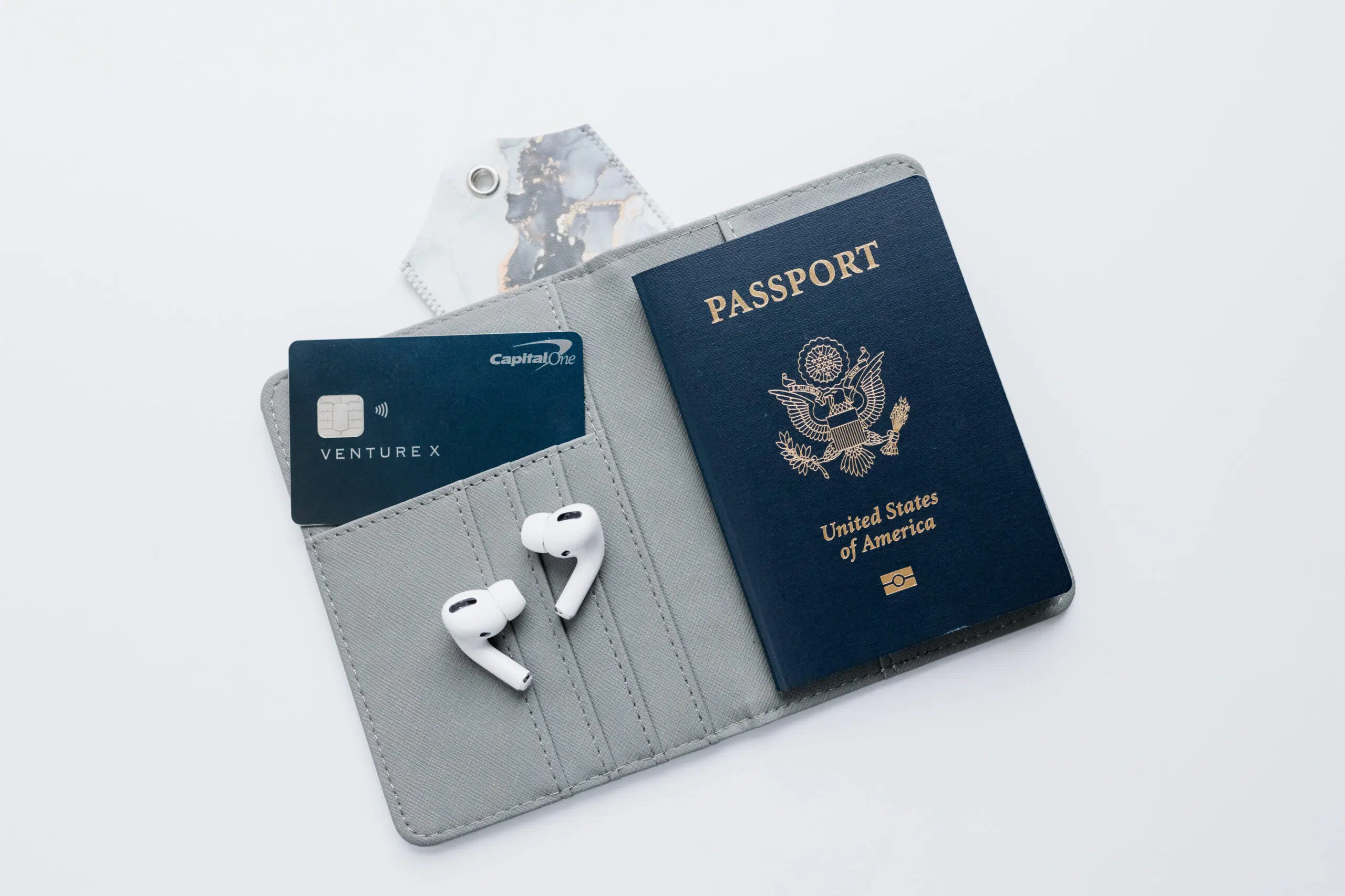 Capital One Venture x in a passport wallet