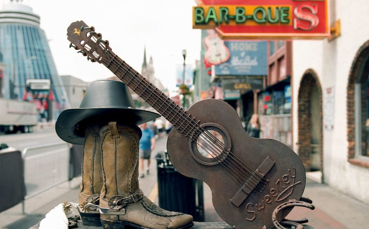 A guitar in front of a building