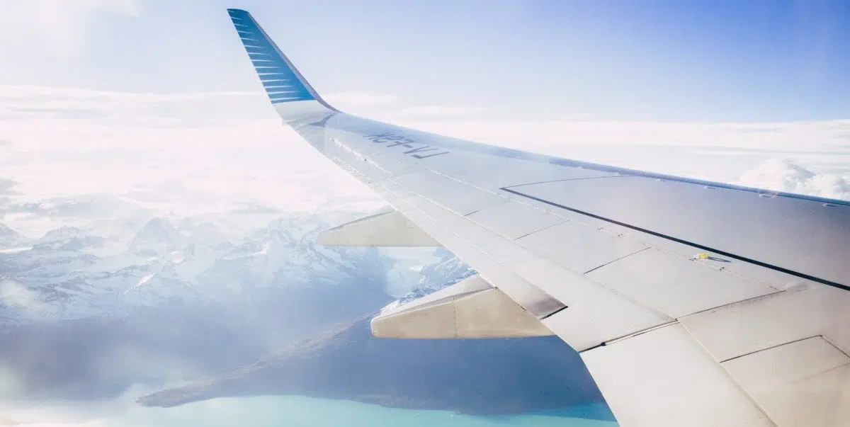 plane wing over the mountains