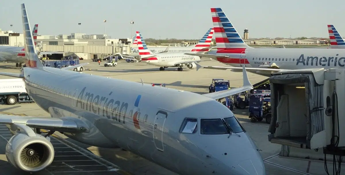 A large passenger jet sitting on top of a runway