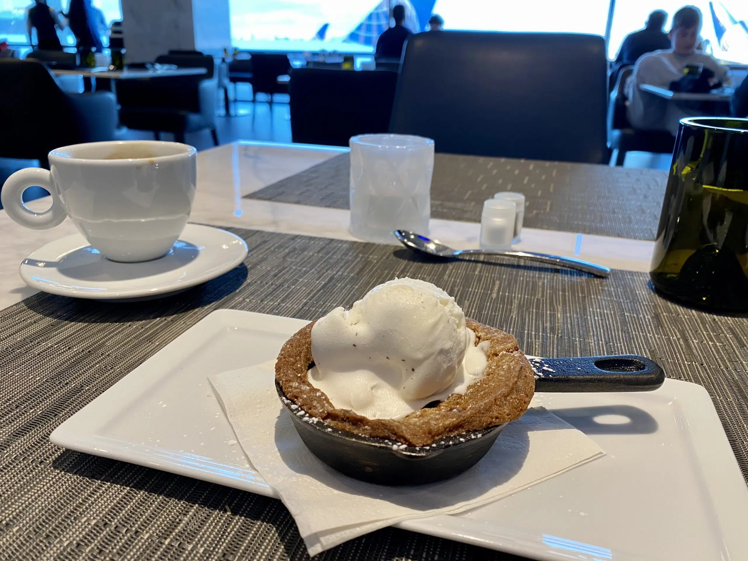 skillet of chocolate chip cookie with ice cream